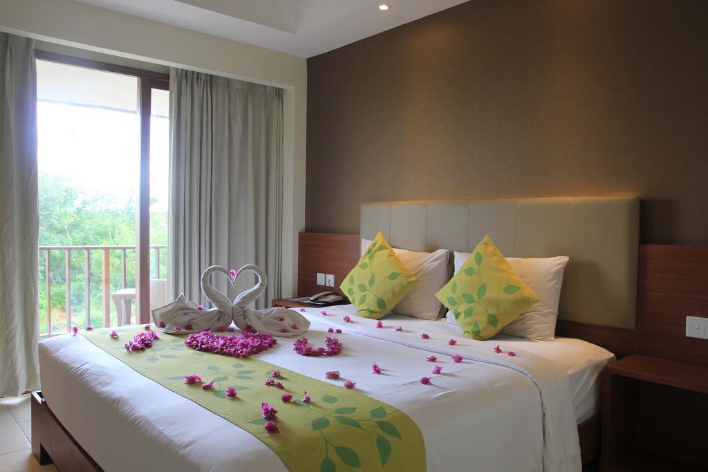New Kuta Hotel Uluwatu Esterno foto